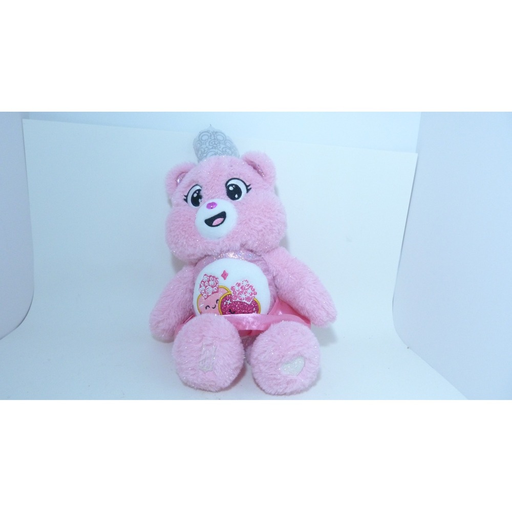 Care Bears x Wicked "Love-a-Lot Bear as Glinda" Crossover Plush.
